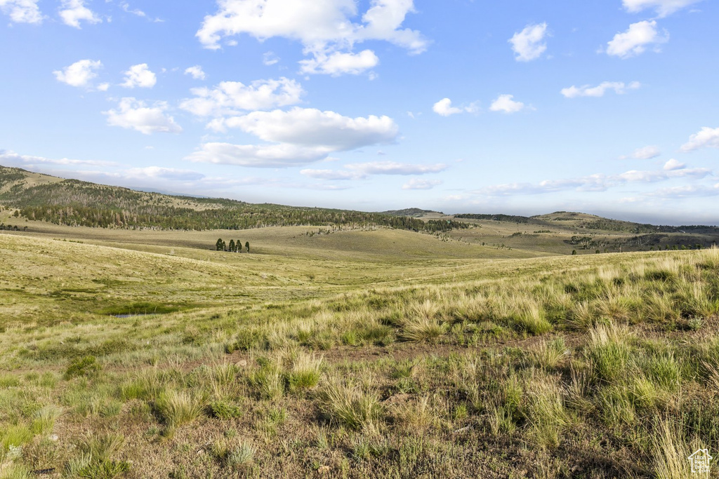 View of mountain feature with a rural view