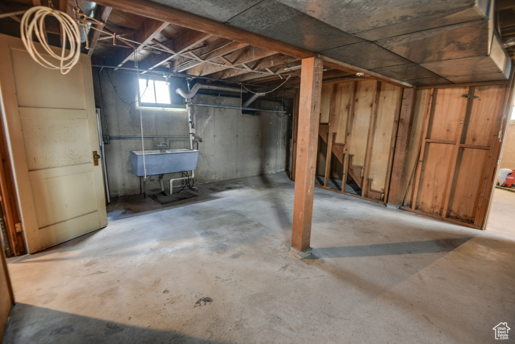 Basement featuring sink
