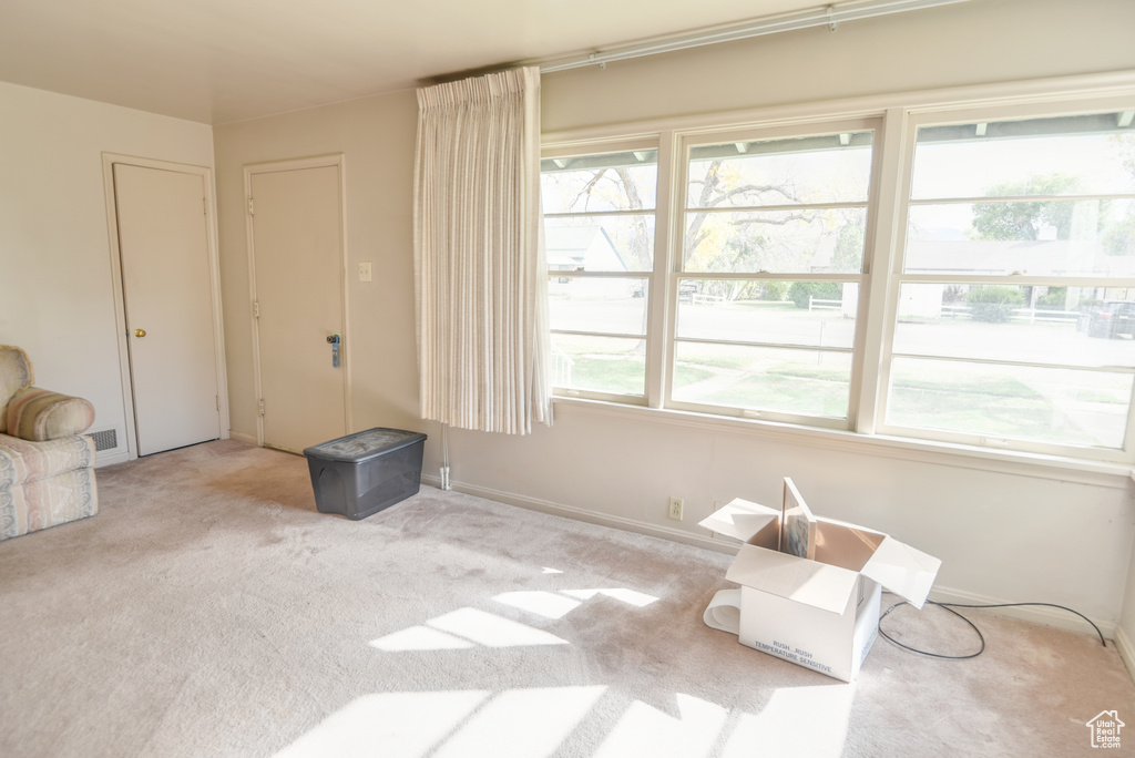 Interior space with light colored carpet