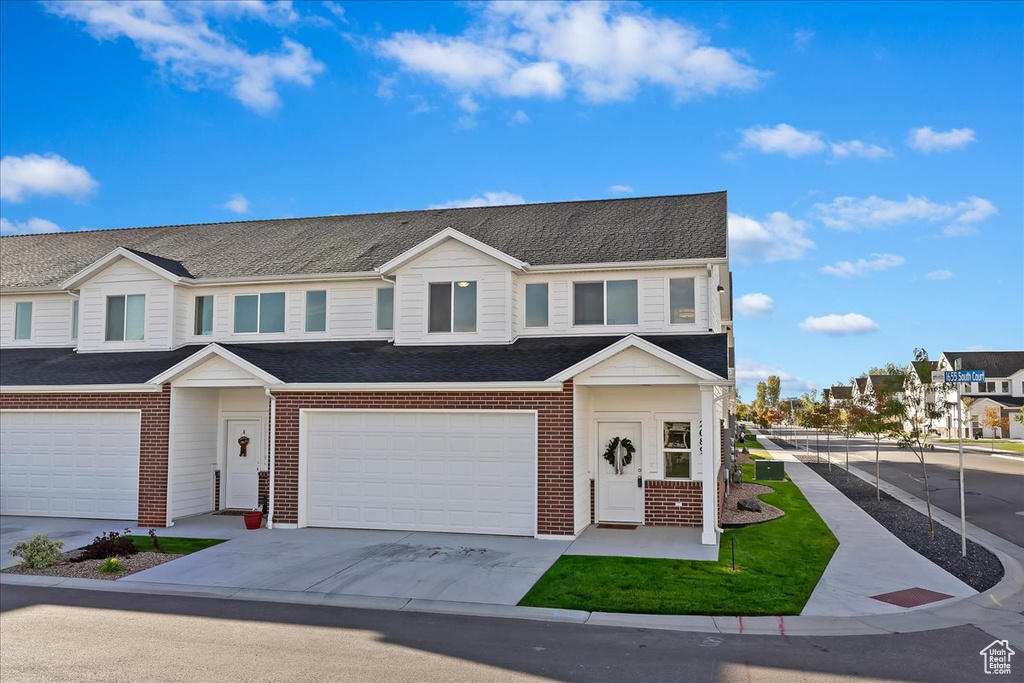 View of front of home featuring a garage