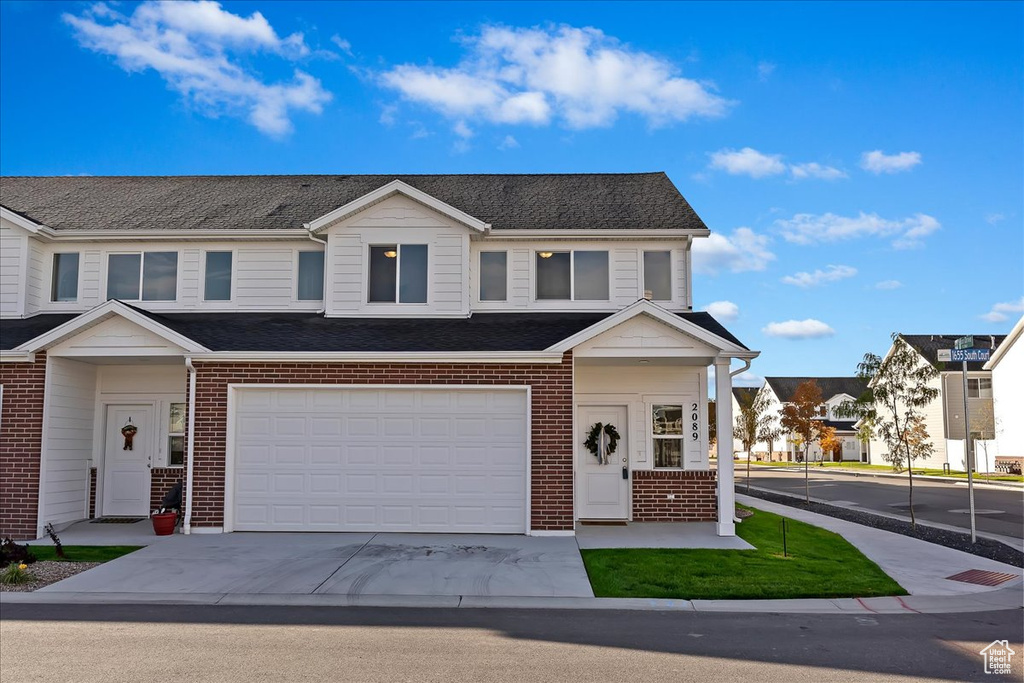 View of front of home with a garage