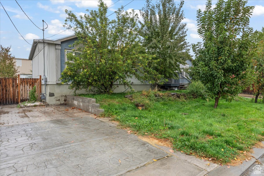 View of property exterior featuring a patio area