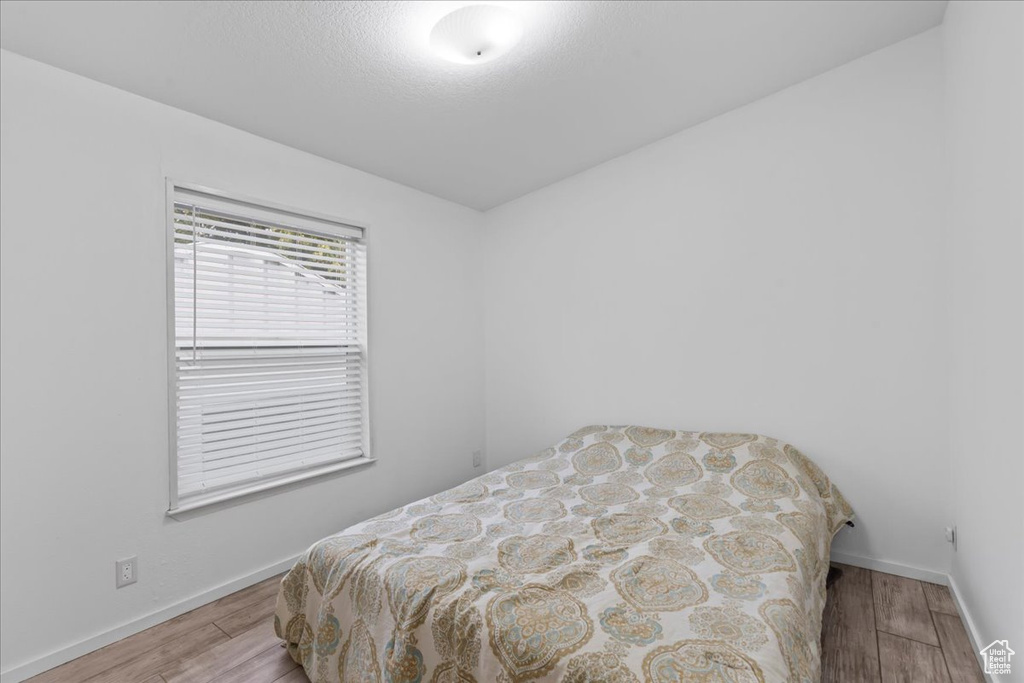 Bedroom featuring light wood-type flooring