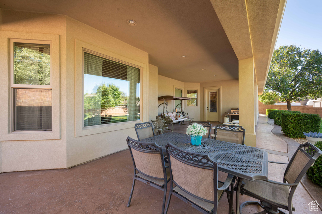 View of patio with an outdoor kitchen