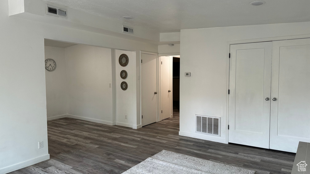 Interior space with dark wood-type flooring