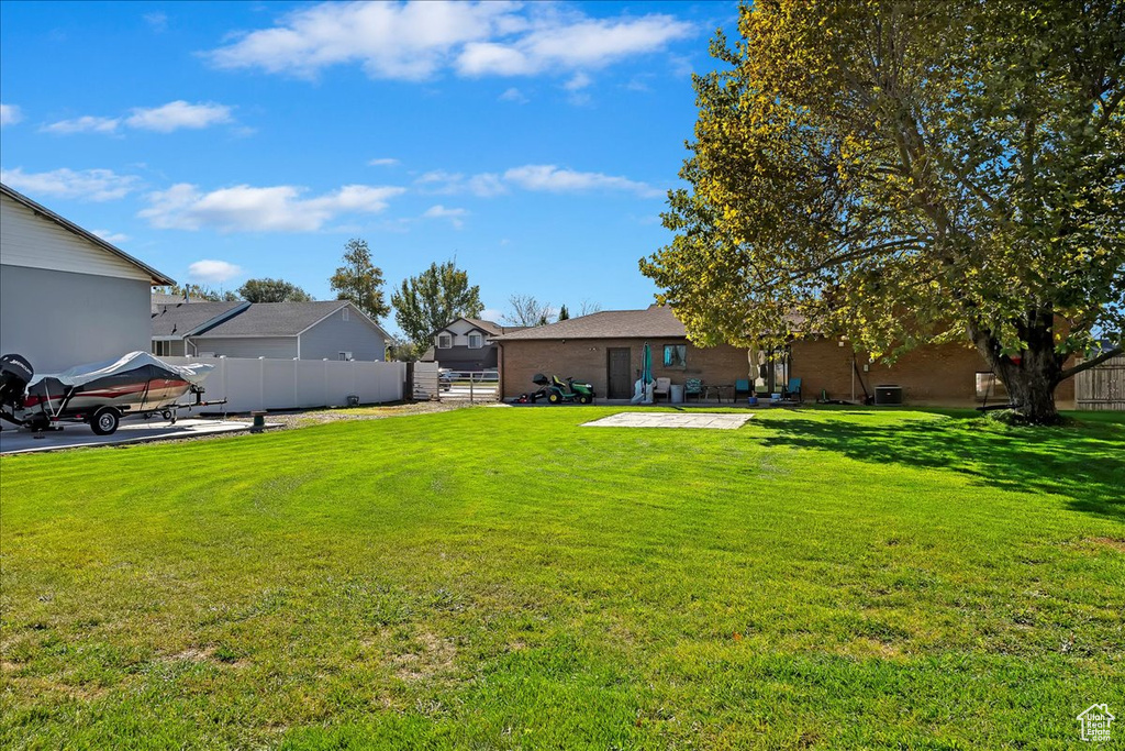 View of yard with a patio