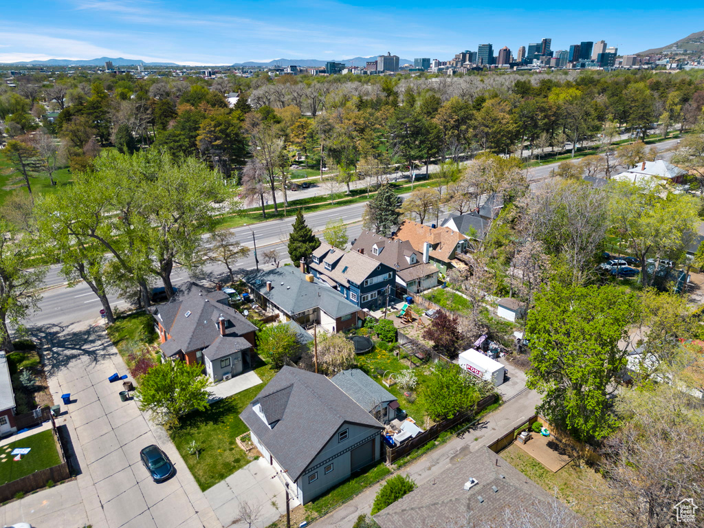 Birds eye view of property with a mountain view