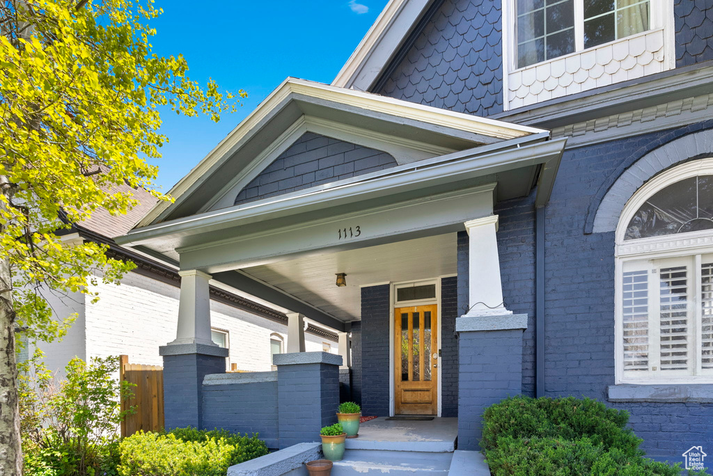 Property entrance featuring a porch