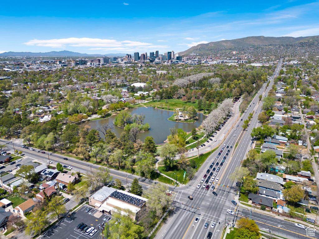 Drone / aerial view with a water and mountain view