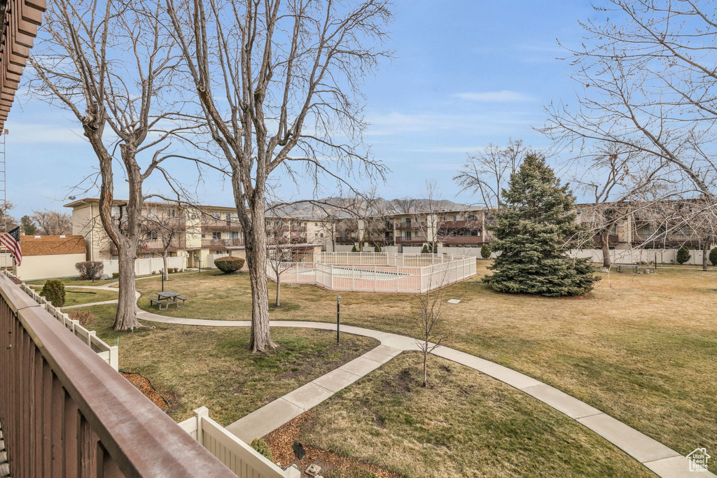 View of yard with a swimming pool