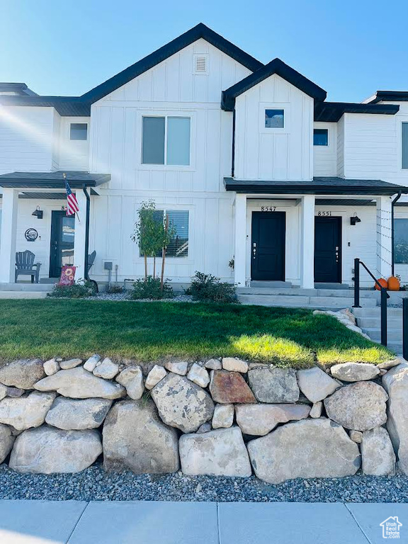 View of front of home with a front yard