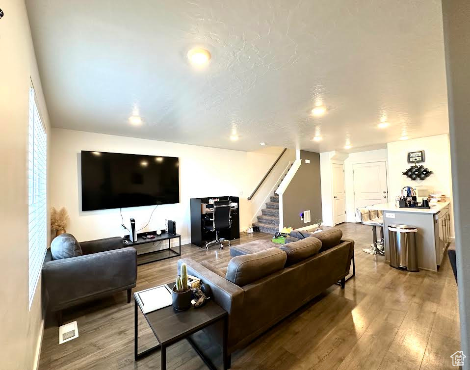 Living room featuring hardwood / wood-style flooring