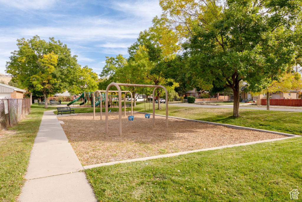 View of playground with a yard