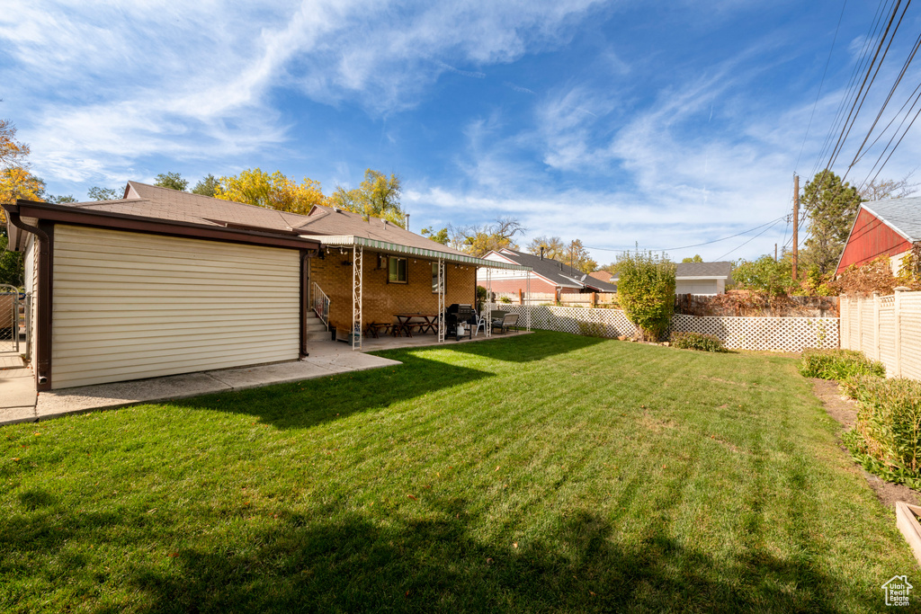 View of yard featuring a patio