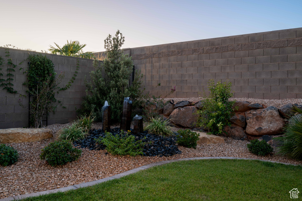 View of yard at dusk