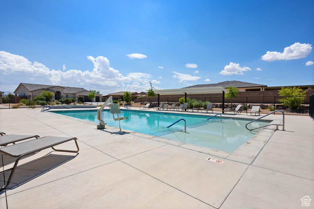 View of swimming pool featuring a patio area