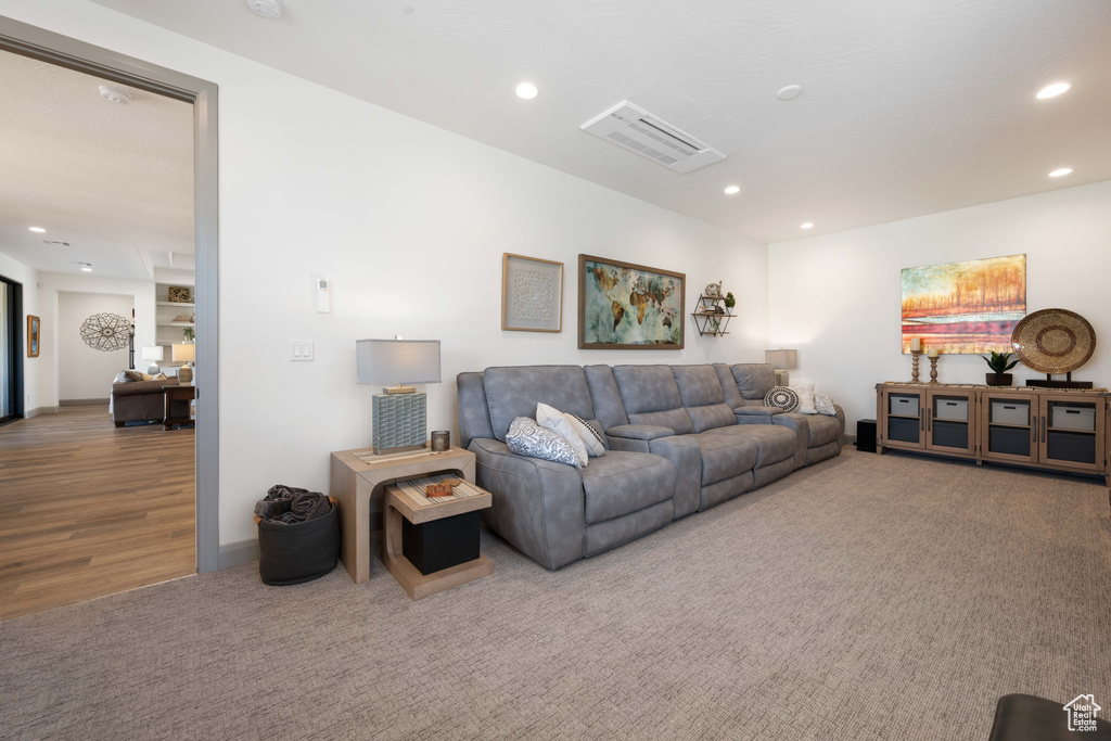 Living room with hardwood / wood-style floors