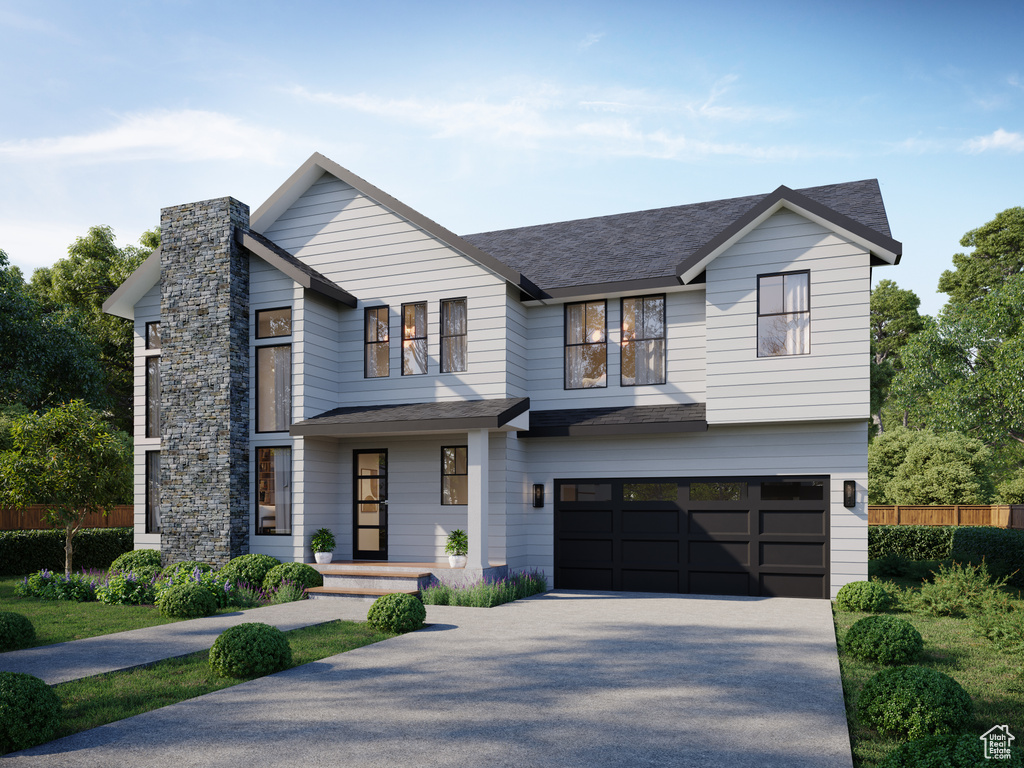 View of front of home featuring a garage