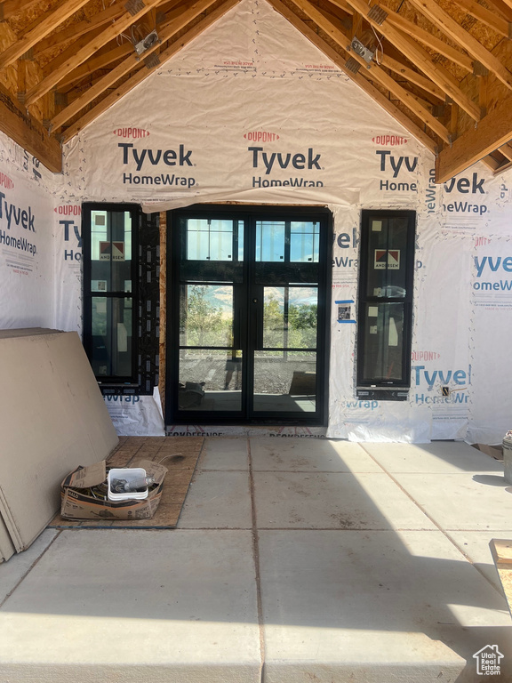 Property entrance featuring french doors