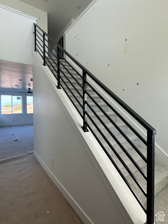 Stairs with concrete flooring