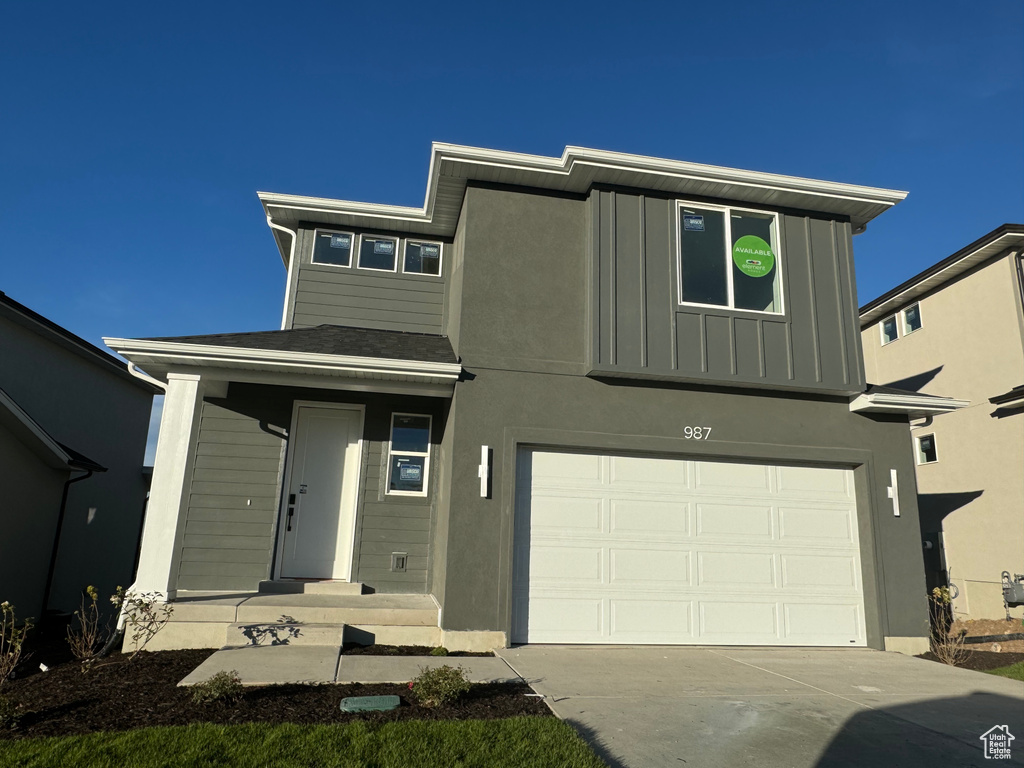 View of front of home with a garage