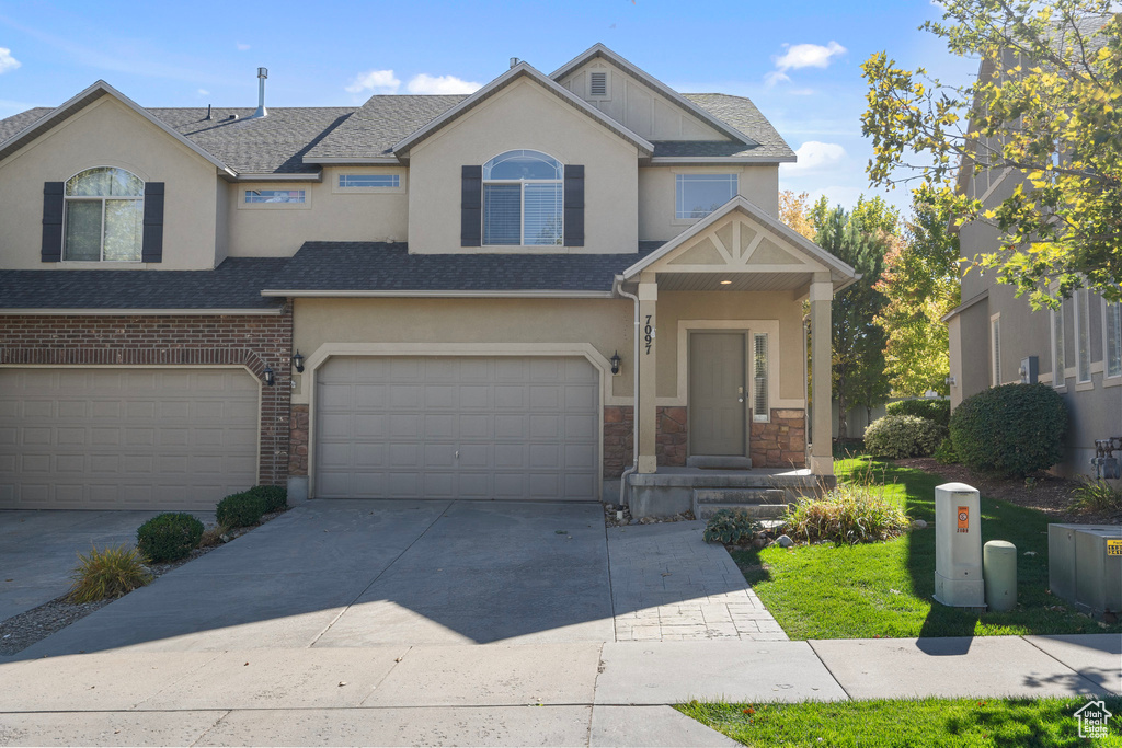 View of front of home with a garage