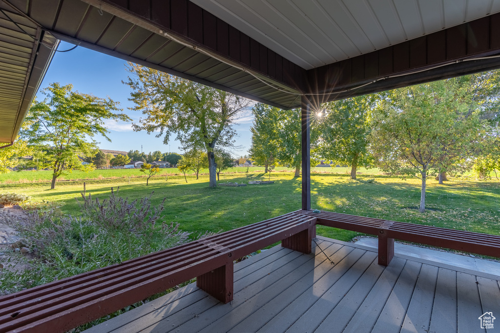 Wooden terrace with a yard