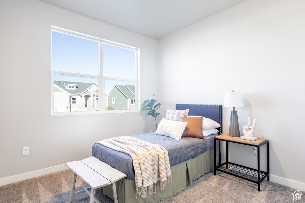 Bedroom featuring carpet