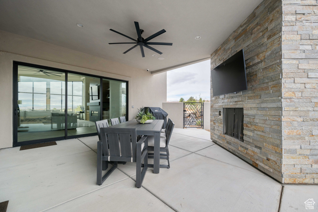 View of patio with ceiling fan