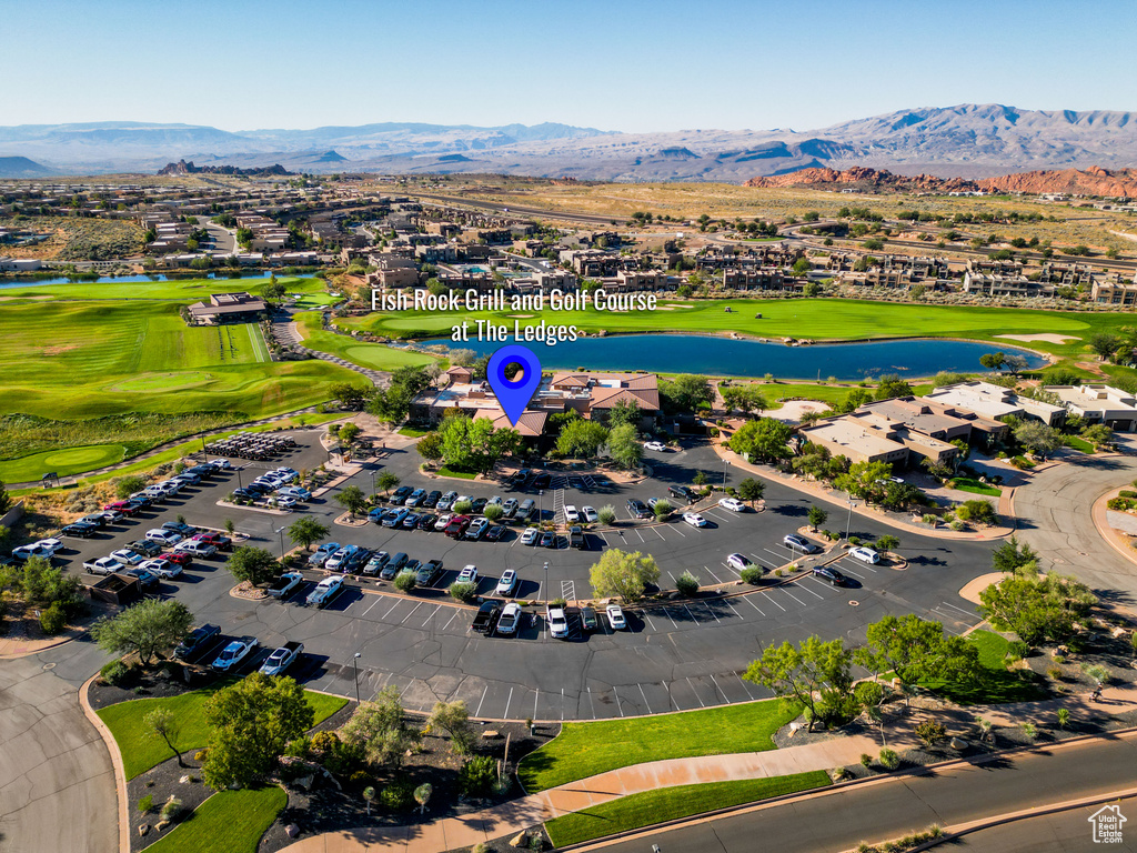 Aerial view featuring a water and mountain view