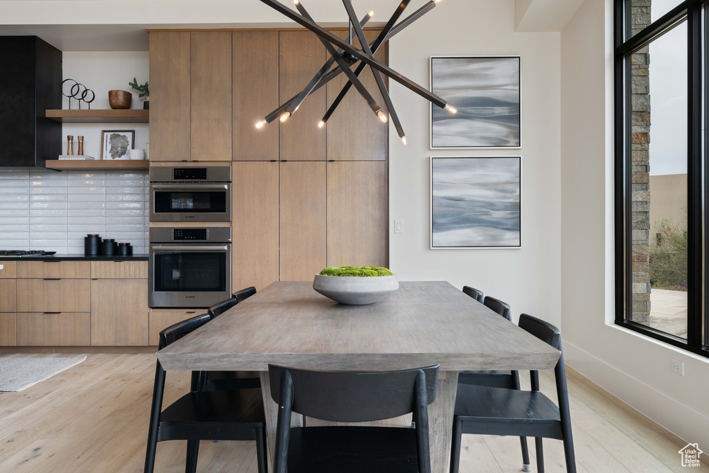 Dining area featuring light hardwood / wood-style flooring