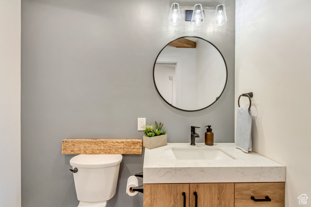 Bathroom with vanity and toilet