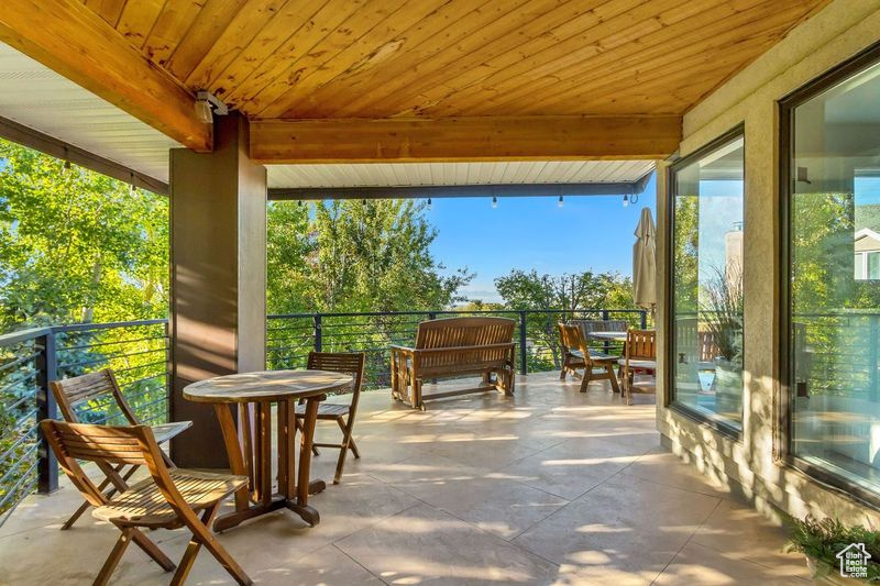 Exterior space featuring beamed ceiling and wooden ceiling