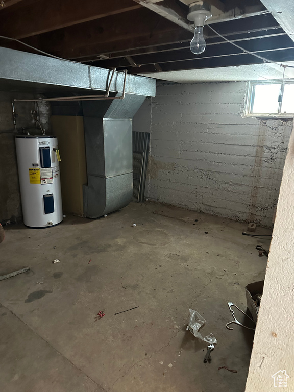 Basement featuring water heater
