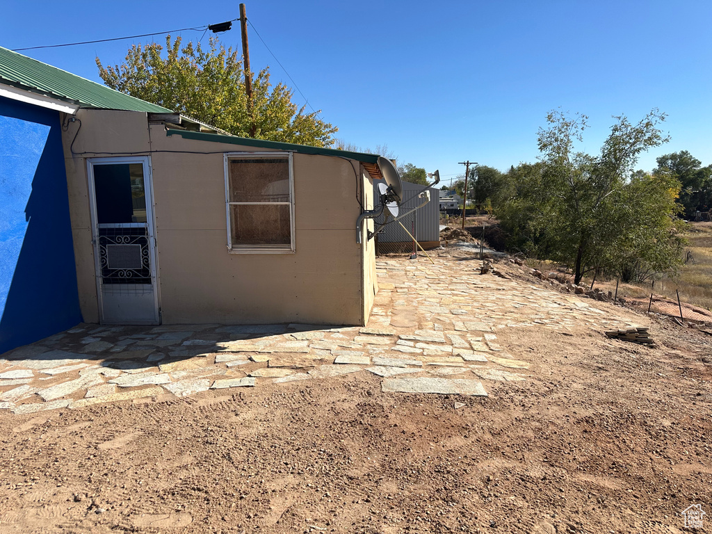 Exterior space with a patio