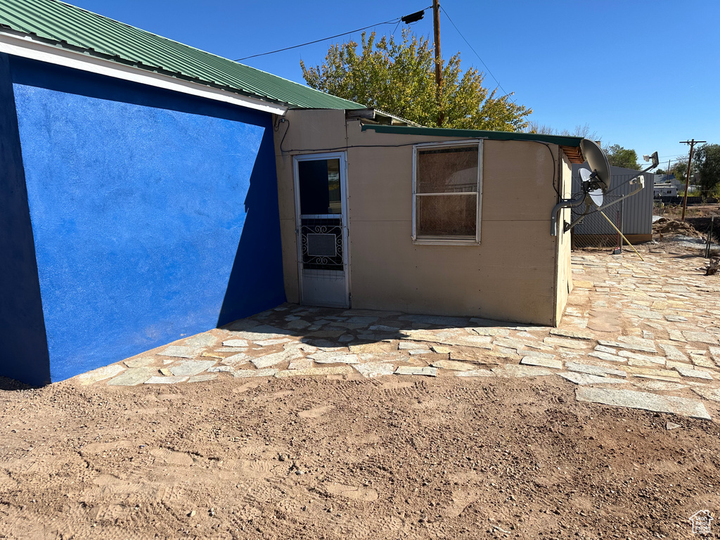 Back of property with a patio area