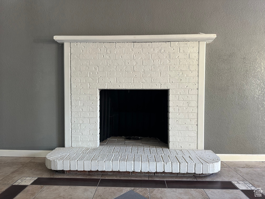 Interior details with a brick fireplace