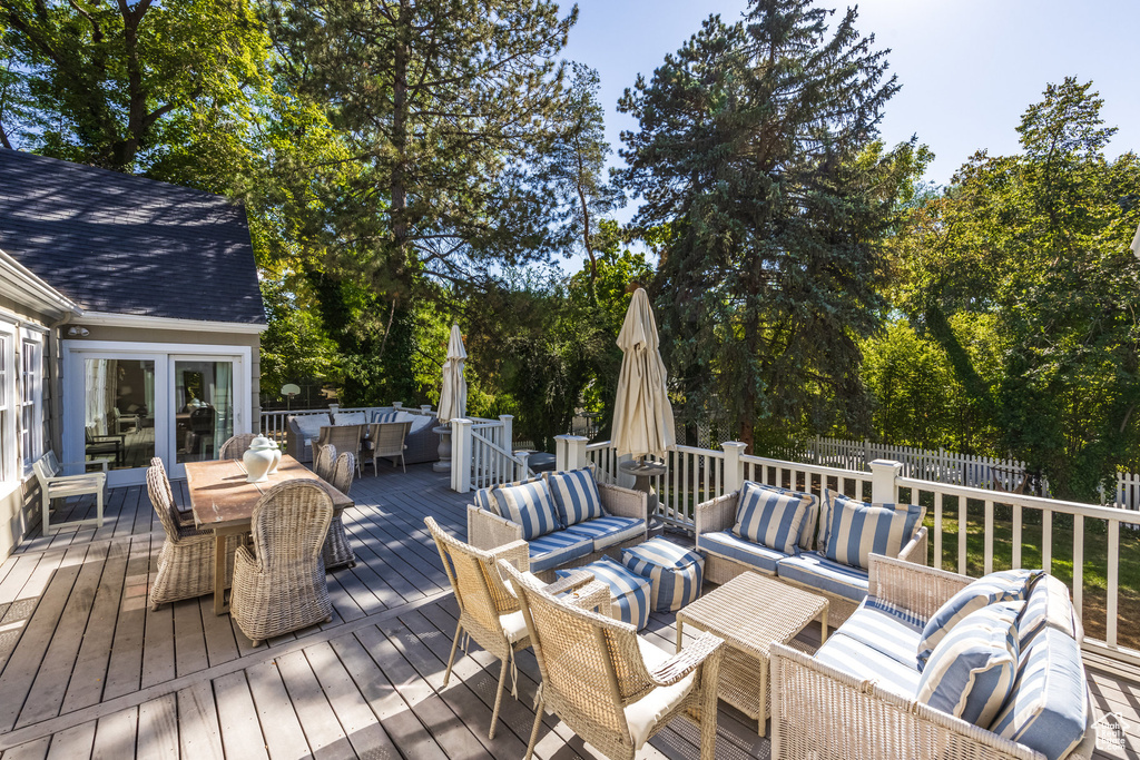 Wooden terrace with an outdoor living space