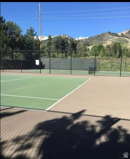 View of sport court featuring a mountain view