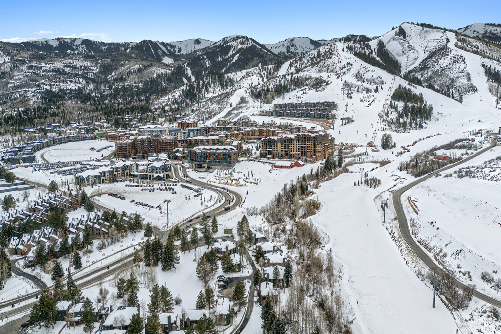 Snowy aerial view with a mountain view