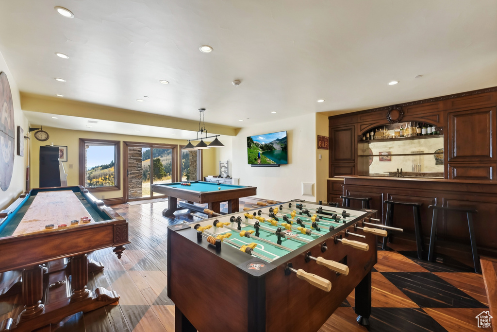 Rec room with pool table and light wood-type flooring