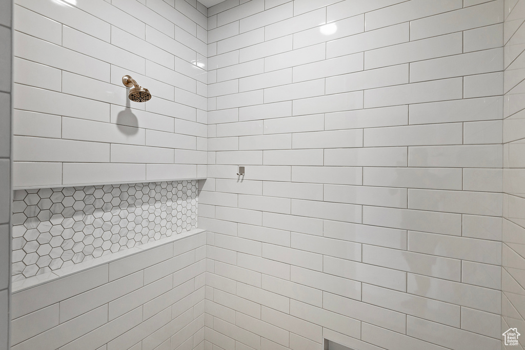 Bathroom with tiled shower