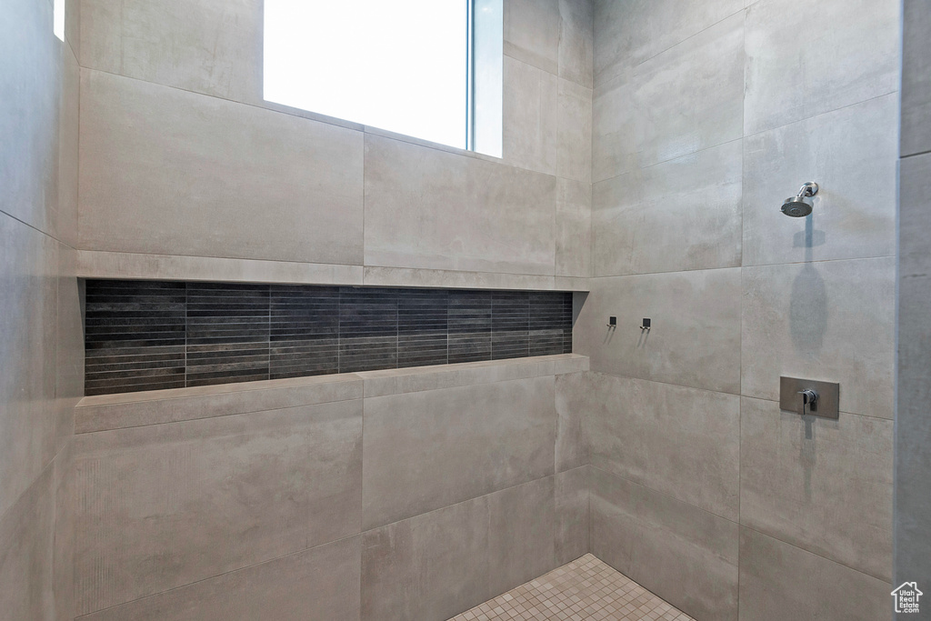 Bathroom with a tile shower