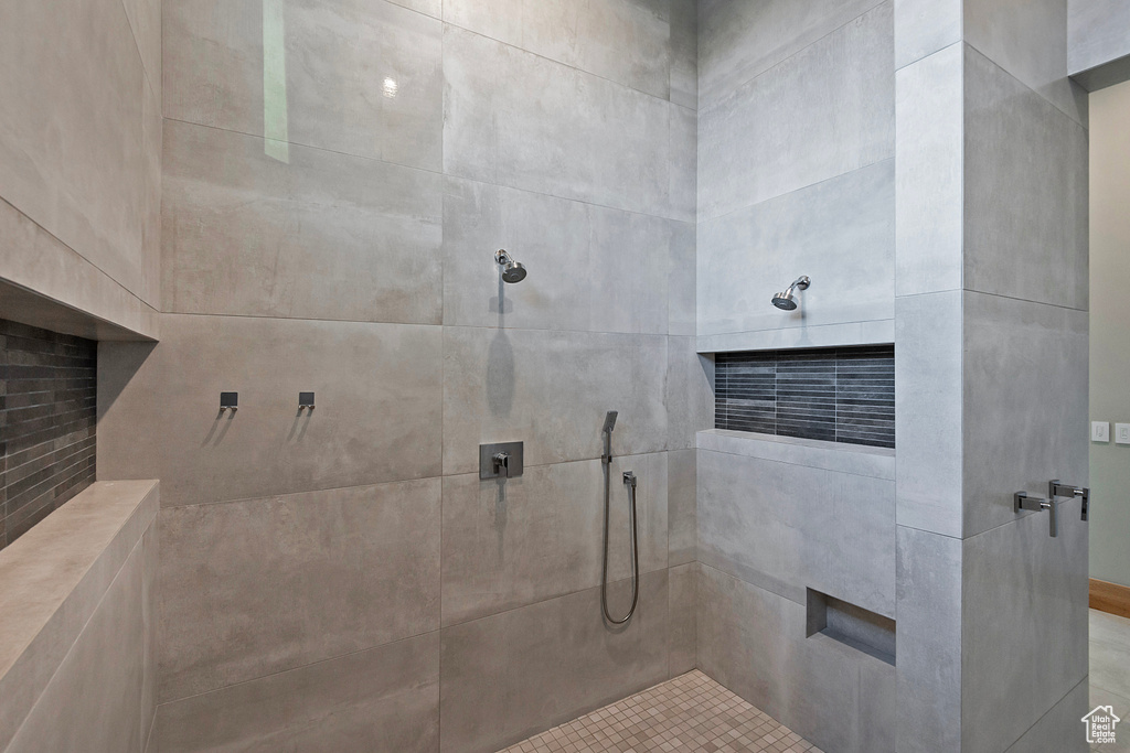 Bathroom with tiled shower