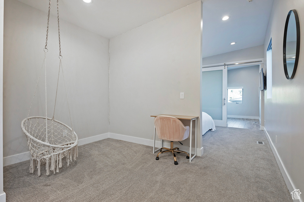 View of carpeted home office