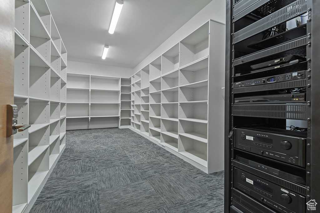 Spacious closet with wine cooler