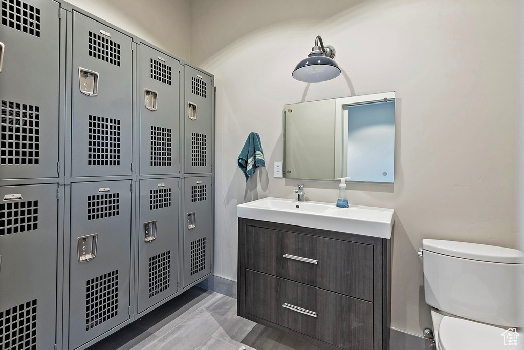 Bathroom featuring vanity and toilet