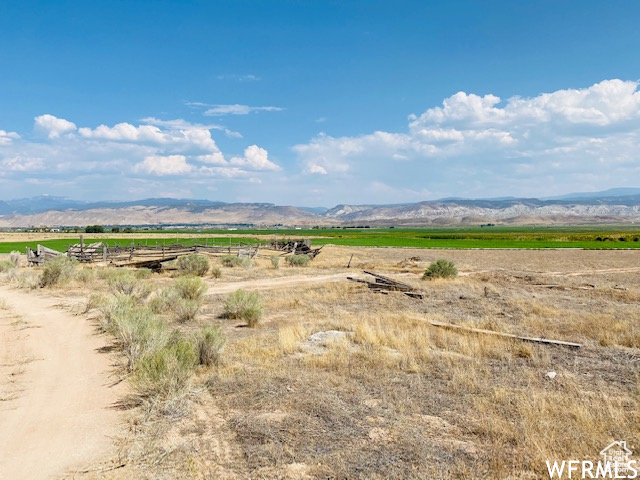 Property view of mountains featuring a rural view