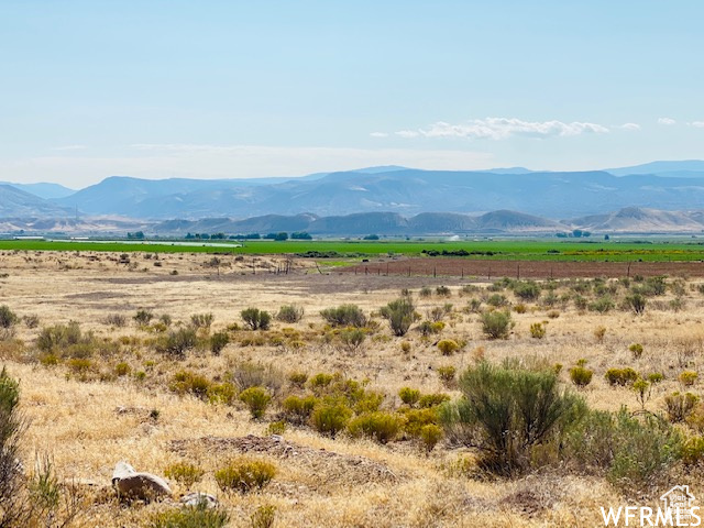 Property view of mountains featuring a rural view