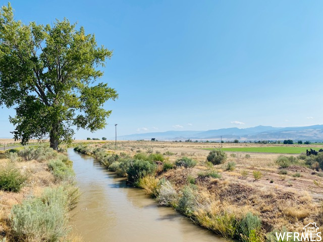 Property view of mountains featuring a rural view